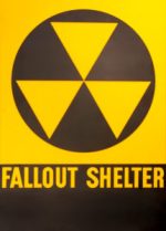 A classic 1950s cold war fallout shelter sign.